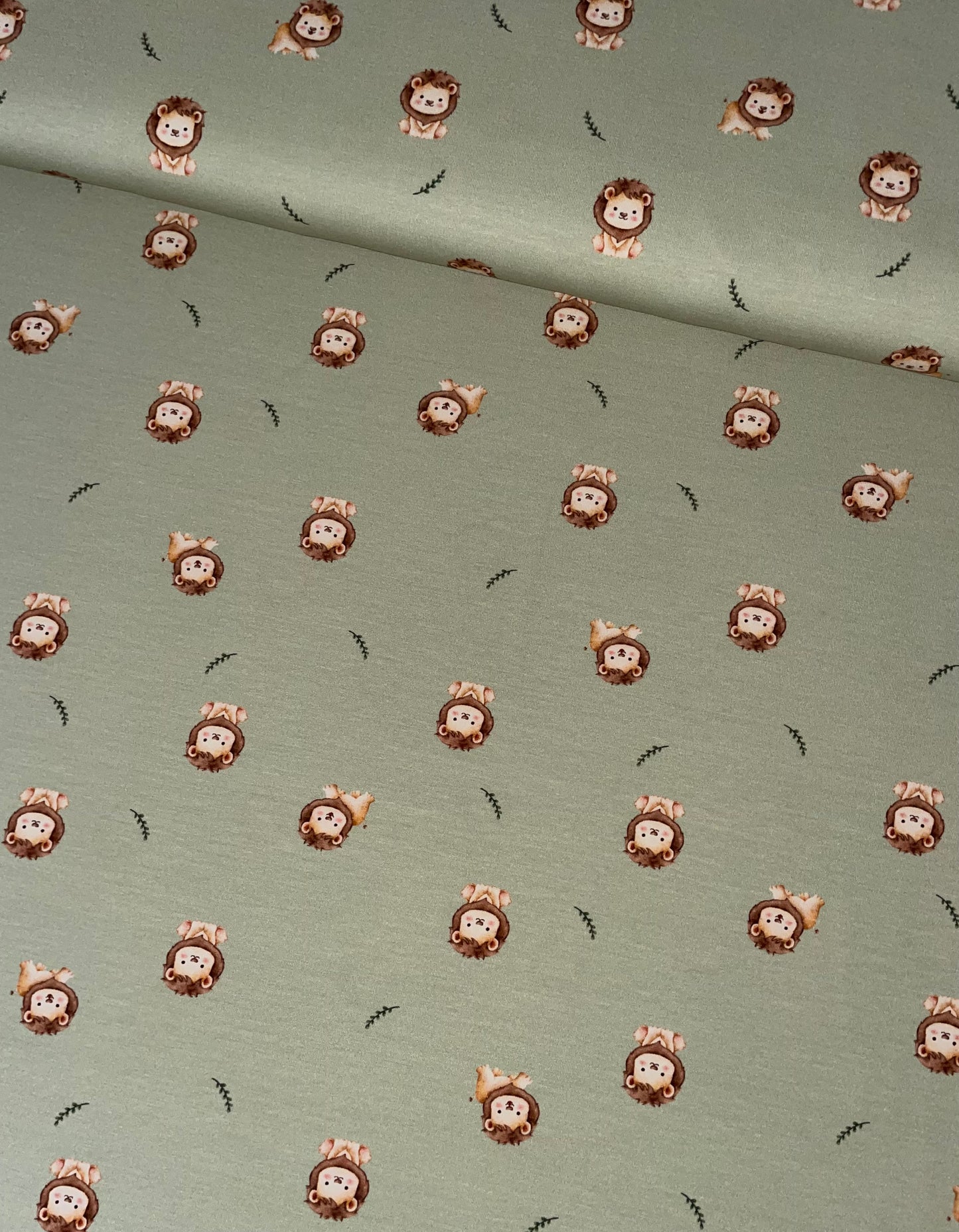 Baumwolljersey kleiner Löwe grün