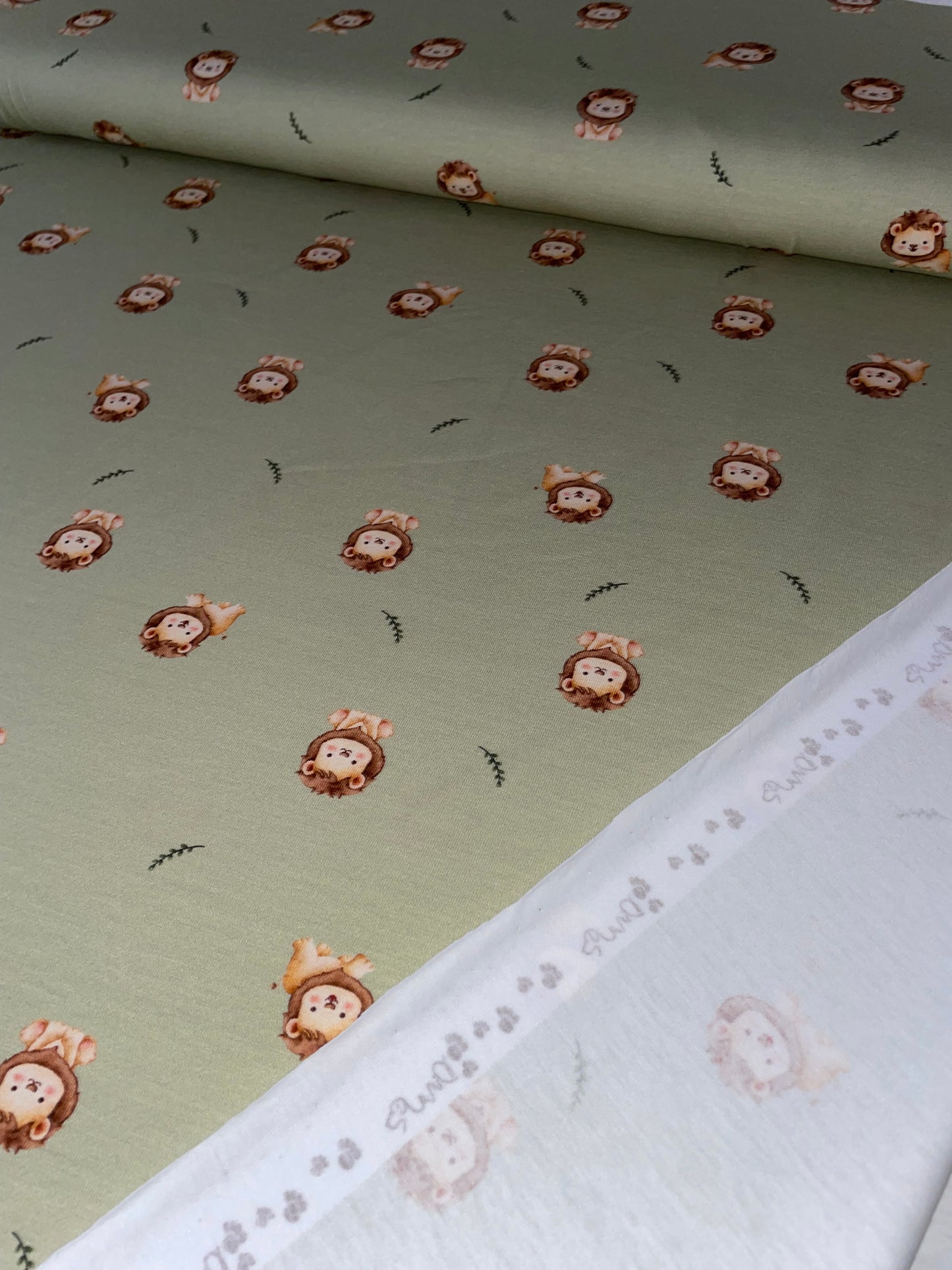 Baumwolljersey kleiner Löwe grün